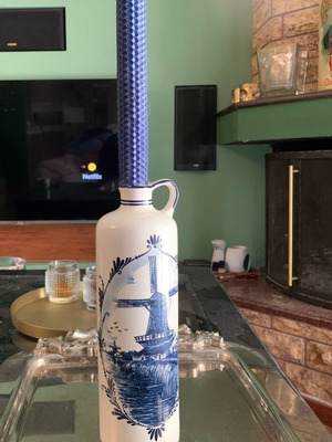 Delft bottle with hand-painted design and candle like new