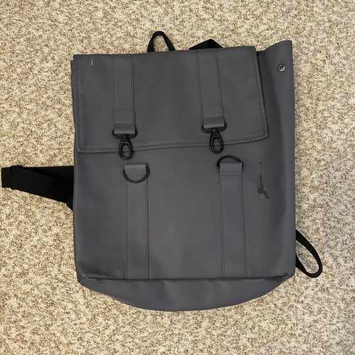Rains backpack men's used with front wear, gray