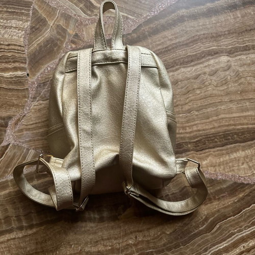 Backpack like new, gold color