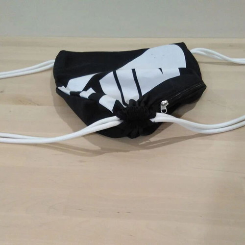 Nike unisex medium athletic drawstring bag used, black and white