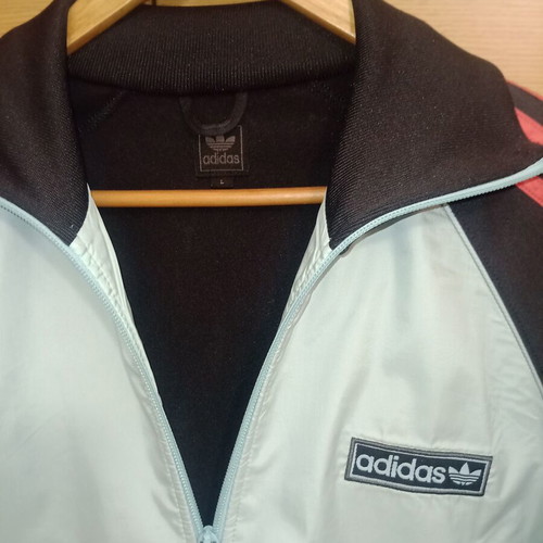 Adidas jacket used, light blue with red stripes, size L