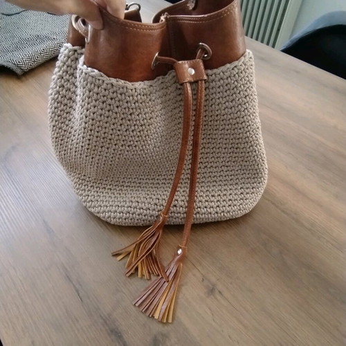 Handmade bucket bag used with brown leather details