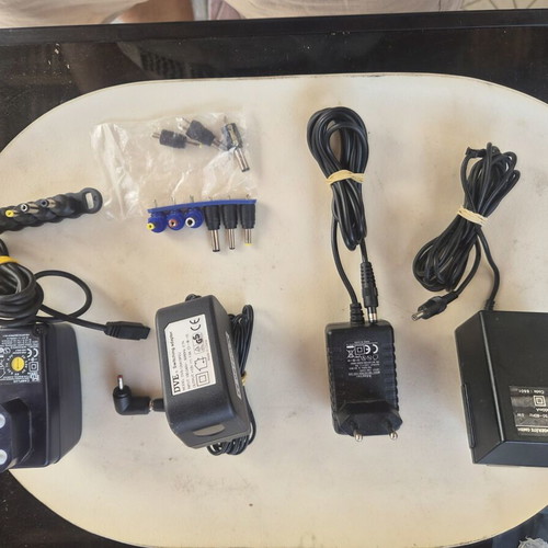 Adjustable power chargers with various plugs for electronics and laptops