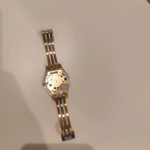 Swatch watch like new, gold and silver