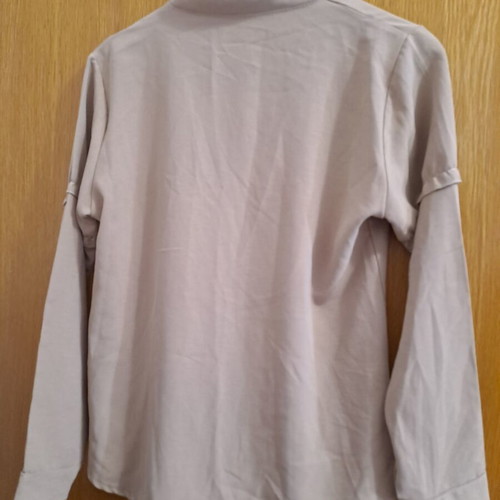 Women's beige shirt with ruffle details, new