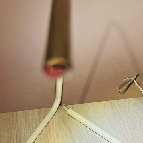 Minimalist white lamp with USB port used