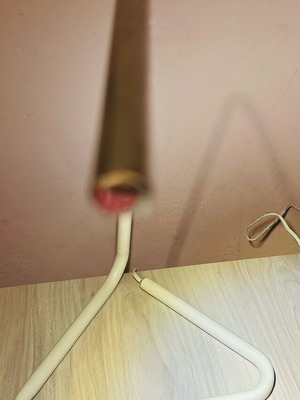 Minimalist white lamp with USB port used