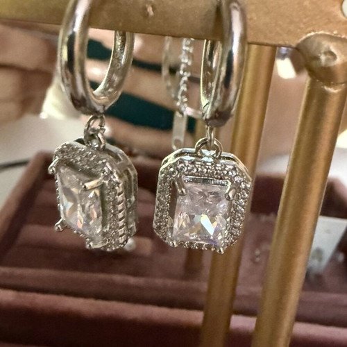 Earrings new, silver color
