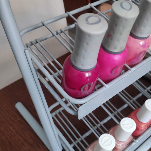 Orly metal tabletop stand with 36 slots for nail polishes used