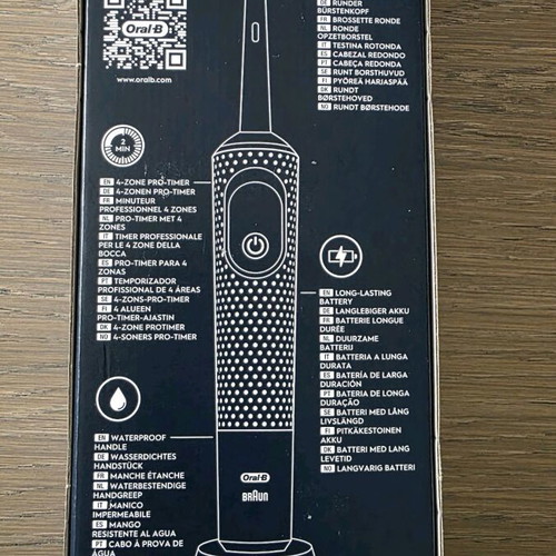 Oral-B electric toothbrush new with 4 replacement brush heads