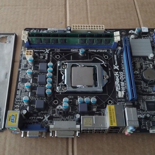 ASRock H61M-DGS motherboard with Intel Pentium G645 CPU, fan and 6GB RAM like new