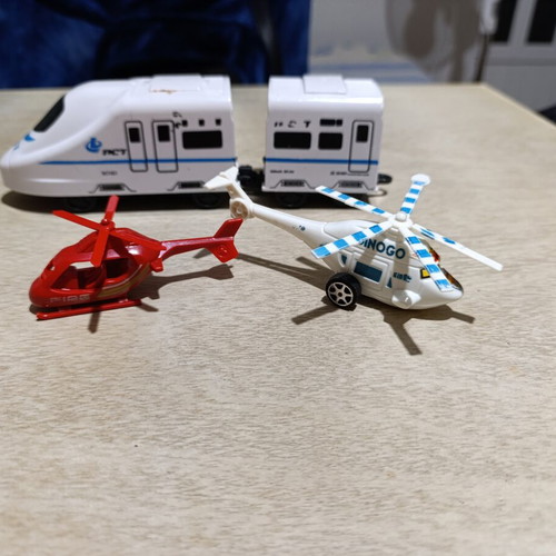 Plastic helicopter and train figures used