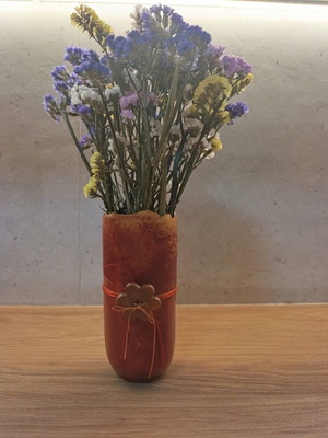 Ceramic vase new with irregular neck and orange-red color