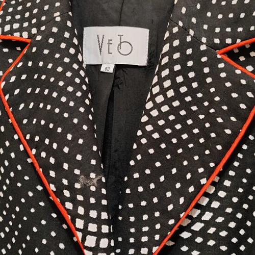 Women's black and white jacket with red piping like new