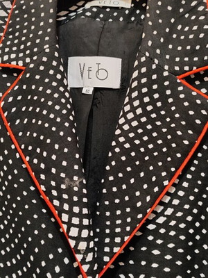 Women's black and white jacket with red piping like new