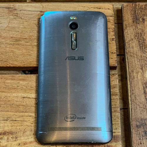 ASUS smartphone for parts or repair, non-working
