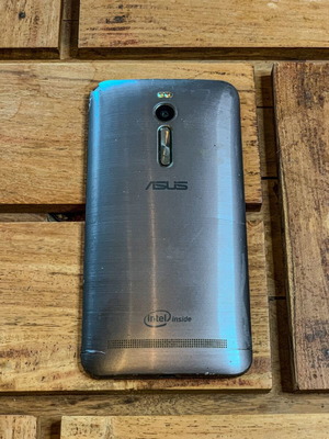 ASUS smartphone for parts or repair, non-working