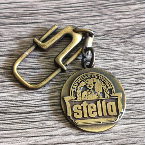 Stella pasta keychain used, vintage metal