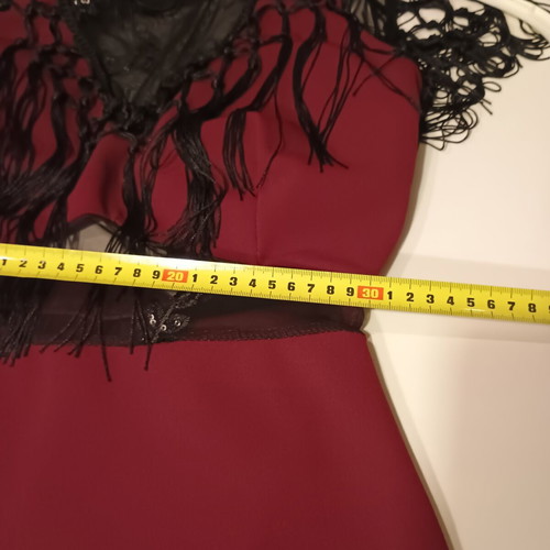 Midi dress for special occasions like new, burgundy with lace and fringes
