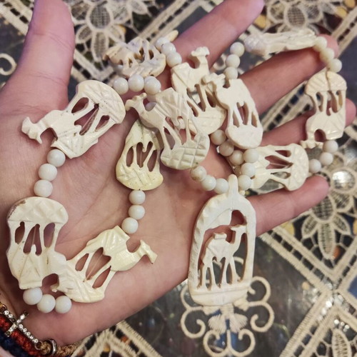 Vintage bone necklace with elephants used