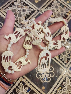 Vintage bone necklace with elephants used