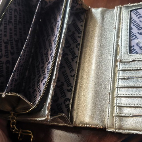 Juicy Couture red wallet used with side wear on gold details