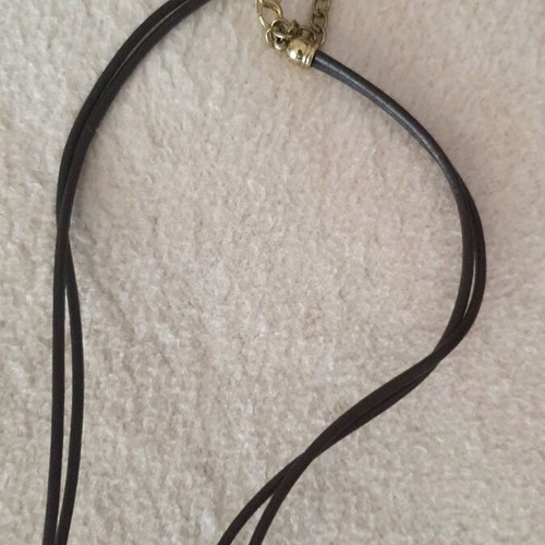 Necklace with 3 spiral designs new, black and gold