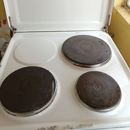 Stove used, burners work, oven heats slowly
