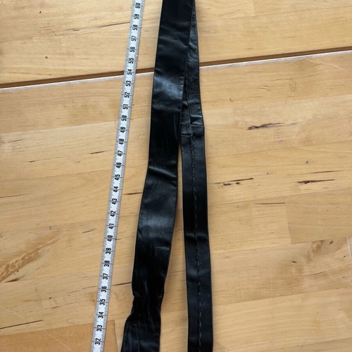 Leather black tie used with gray detail