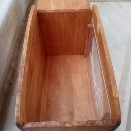 Wooden breadbox with hinged lid and metal handle used
