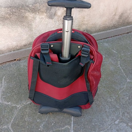 Rolling backpack 6 compartments like new, red