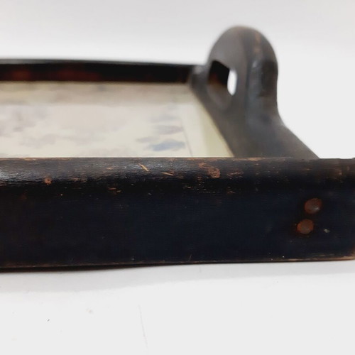 Vintage wooden tray with glass panel and painted design used