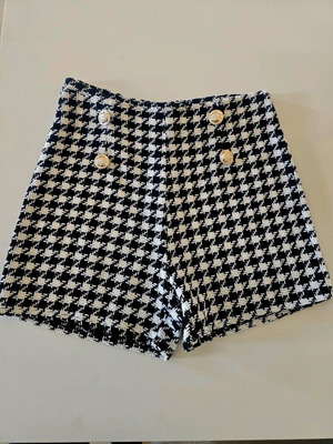 Women's shorts like new, black and white with silver buttons