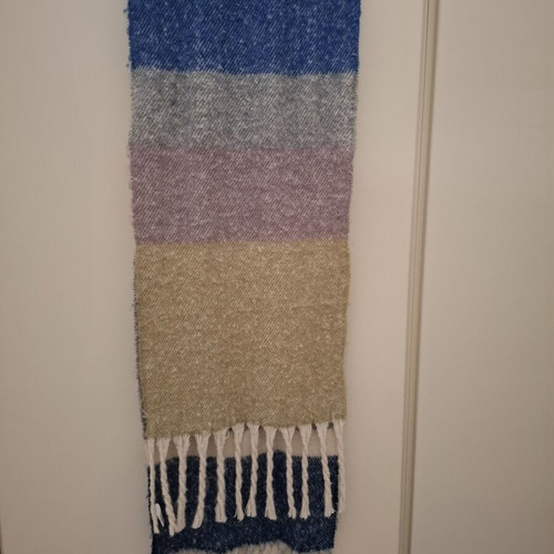 Knitted pashmina scarf in warm colors