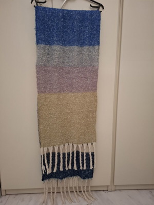 Knitted pashmina scarf in warm colors