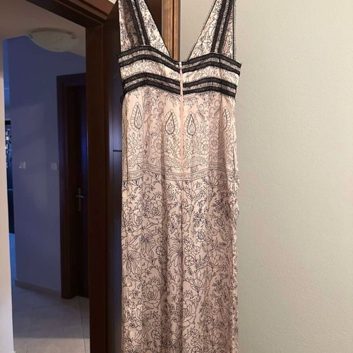Zini one-piece small like new, black and beige