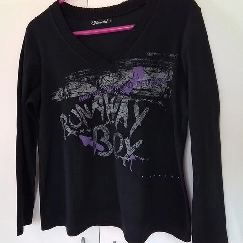 Romella black blouse with long sleeves and design like new
