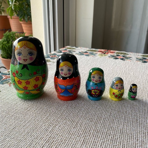 Matryoshka doll collectible like new, set of 5 with unique costumes