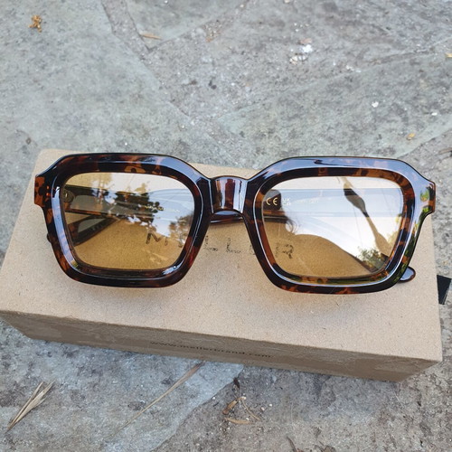 Meller Nayah sunglasses used, tiger yellow colorway