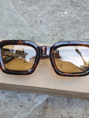 Meller Nayah sunglasses used, tiger yellow colorway