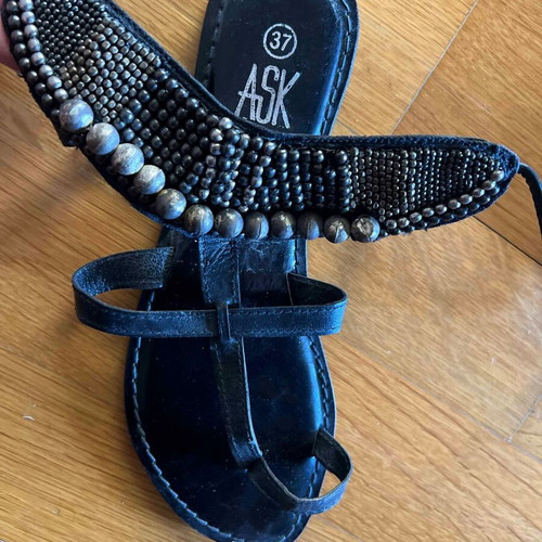 Leather vintage black sandals new, decorated with metal pearls