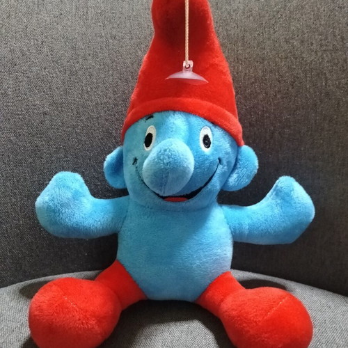 Cross-eyed Smurf plush toy
