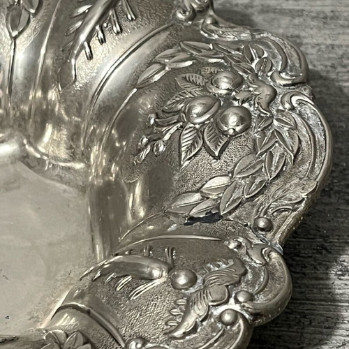 Decorative metal bowl used with embossed design