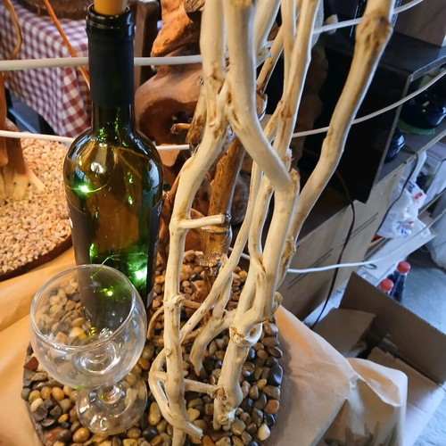 Table lamp with ivy wood, Merlot bottle, and wine glass
