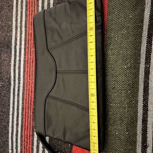 Leather toiletry bag used black