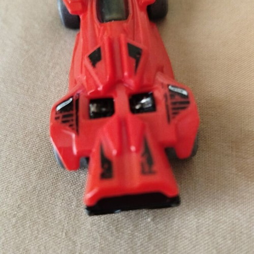Hot Wheels metal toy car with racing design, like new