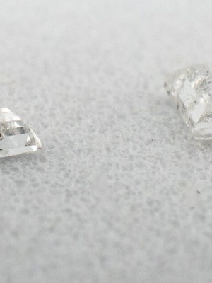 Tapered Baguette Diamonds used, matching pair 0.11 CTW