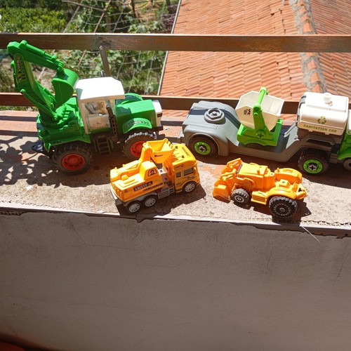 Children's construction and specialized toy trucks set of 4 used