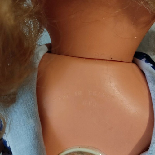 Vintage French doll used, in good condition with one eye sticking