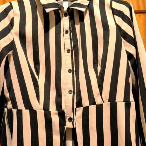 Women's shirt used with vertical stripes in beige and black